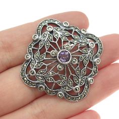 Great vintage condition.  JUDITH JACK 925 Sterling Silver Vintage Real Amethyst & Marcasite Pin Brooch  Weight: 11.6g   WELCOME TO PAWN SHOP We are an actual pawn shop and have been in business for over 25 years. Since 1990, our establishment has been serving a variety of clients by providing them with short term cash solutions and options of liquidity regarding their treasured heirlooms. Acknowledging that today′s customers are very sophisticated and are looking for a variety of investments, our acquisitions are hand-picked for our special clientele. We do offer the most interesting items along with affordable prices. We do not disturb our vintage jewelry in order to keep its original patina leaving it to your discretion. Depending on your own taste, you can either polish it or keep it in Vintage Silver Brooch With Gemstone, Vintage Silver Gemstone Brooch, Vintage Gemstone Brooches, Pawn Shop, Pin Brooch, Hand Picked, 25 Years, Brooch Pin, Patina