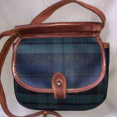 Vintage Ralph Lauren Leather Shoulder Bag With Blue And Green Plaid Pattern, Brown Leather Straps, And Brass Hardware. 8 Inch Length 2.5 Inch Width 8 Inch Height Classic Blue Pouch Bag, Green Leather Trim Crossbody Shoulder Bag, Elegant Green Shoulder Bag With Leather Trim, Vintage Blue Bag With Detachable Strap, Blue Vintage Satchel With Detachable Strap, Classic Blue Shoulder Bag With Leather Handles, Blue Rectangular Shoulder Bag With Leather Trim, Casual Blue Shoulder Bag With Leather Trim, Vintage Blue Bag With Leather Handles