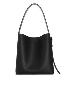 Leather Tote - Black - ARKET WW Sleek Shoulder Bag With Adjustable Strap For Everyday, Sleek Bag With Adjustable Strap, Sleek Tote Bag With Adjustable Strap, Sleek Tote Shoulder Bag With Adjustable Strap, Sleek Tote Shoulder Bag With Detachable Strap, Sleek Shoulder Bag With Detachable Strap And Tote Shape, Sleek Business Shoulder Bag With Adjustable Strap, Modern Briefcase Tote With Adjustable Strap, Sleek Shoulder Bag With Adjustable Strap