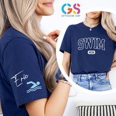 a woman wearing a blue shirt with the word swim on it in front of her