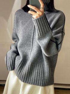 Turtleneck, solid, knit sweater - available in 3 colors.    MATERIALS   · 90% Cashmere, 10% Wool CARE   Hand wash at max. 30ºC/86ºF    Do not use bleach    Iron at a maximum of 110ºC/230ºF     Do not dry clean    Do not tumble dry Elegant Winter Sweater With Ribbed Cuffs, Elegant Solid Color Sweater For Fall, Elegant Long Sleeve Winter Sweater, Classic Gray Winter Tops, Elegant Gray Winter Tops, Elegant Gray Winter Top, Elegant Solid Color Funnel Neck Sweater, Classic Gray Sweater With Ribbed Collar, Elegant Wool Sweater For Fall