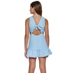 Little Peixoto Blair cut-out dress in blue cotton skies. Dress features cut-out accents, knotted details, and a ruffle hem. Pullover style. Imported. Size Conversion: (XS = 2/4), (S = 6/8), (M = 10/12), (L = 14). Beach Cotton Dress With Bow Tie Back, Light Blue Summer Mini Dress With Tie Back, Chic Blue Dress With Bow Tie Back, Light Blue Casual Mini Dress With Tie Back, Casual Light Blue Mini Dress With Tie Back, Light Blue Casual Dress With Tie Back, Casual Beach Dress With Bow Tie Back, Blue Cutout Mini Dress For Summer, Blair Dress