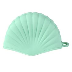 a green shell shaped object on a white background