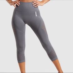 Power Your Performance With The Energy Seamless Leggings. Fully Functional And Fully Shape-Enhancing, These Gym Leggings Help You Through Cardio And Weights Alike With Support And Confidence. Take Care: This Product Is Delicate, So Please Take Appropriate Care When Wearing And Washing - High-Waisted Fit - Eyelet Detailing - Glute Contouring With Mesh Structures - Ribbed Waistband - Heat-Sealed Gymshark Logo To Hip And Back Waistband - 93% Nylon, 7% Elastane. Approximate Measurements: Waist Measu Gymshark Leggings, Gym Leggings, Seamless Leggings, Cropped Leggings, Cardio, Pant Jumpsuit, Capri, Gray Color, Tights