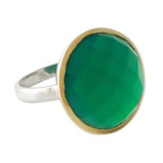 Richly colored enhanced green onyx with its verdant allure crowns this dramatic cocktail ring from Mahavir in India. The 7.5 carat checkerboard-cut stone is set in sterling silver with a halo of gleaming 18k gold plate. A slender polished silver band completes the design..925 Sterling silver Fine Jewelry Green Emerald Cabochon Ring, Green Cabochon Emerald Ring Fine Jewelry, Fine Jewelry Green Cabochon Emerald Ring, Elegant Green Cabochon Emerald Ring, Elegant Green Emerald Cabochon Ring, Green Oval Ring With Bezel Setting, Oval Green Ring With Bezel Setting, Classic Green Cabochon Emerald Ring, Elegant Oval Green Gemstones