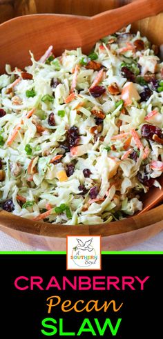 cranberry pecan slaw in a wooden bowl with text overlay that reads, cranberry pecan slaw