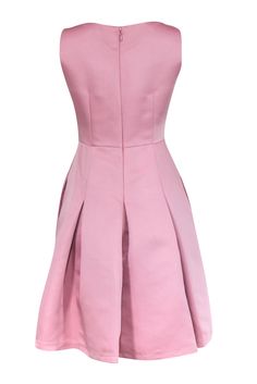 Be the darling dame of your next formal tea in this blush pink dress! This soft and sweet hue of pink adds more of a demure feel to the already ladylike fit and flare silhouette. This would pair gorgeously with a matching slingback heel and shoulder bag! Size 6 100% Polyester Fully lined Fit and flare silhouette Concealed back zipper closure Sleeveless Deep V-neckline Inseam side pockets Bust 32" Waist 28" Shoulder to hem 38" Pink Fitted A-line Dress, Pink Knee-length Prom Dress, Feminine Rose Detail Prom Dress, Pink A-line Midi Dress For Prom, Feminine Bridesmaid Midi Dress With Pleated Bodice, Feminine Prom Dress With Rose Detail, Feminine Fit And Flare Prom Dress, Feminine Pleated Bodice Dress For Prom, Pink A-line Formal Dress