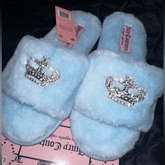 Brand New With Tags Juicy Couture Blue Crown Slippers. Fits Size 6.5-7.5 Trendy Blue Slippers With Round Toe, Trendy Blue Round Toe Slippers, Juicy Couture Slippers, Bday Gifts, Juicy Couture Shoes, Juicy Couture Purse, Boo Basket, Blue Crown, Couture Shoes