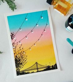 a card with an image of the golden gate bridge in san francisco, california at sunset