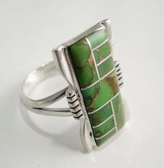 RING GASPEITE STERLING SILVER SIZE 6 FROM NEW MEXICO (Color may vary) Any question about this item Please give us a call 719 465 2742 Unique Green Inlay Rings, Green Inlay Rings For Anniversary, Unique Green Rectangular Rings, Green Anniversary Rings With Inlay, Modern Green Collectible Jewelry, Anniversary Green Inlay Rings, Sterling Silver Green Inlay Rings, Green Sterling Silver Ring With Inlay, Sterling Silver Rings With Green Inlay