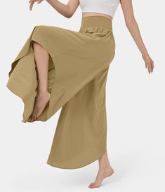 Women's Breezeful™ High Waisted Back Waistband Pocket Palazzo Flowy Ruffle Wide Leg Quick Dry Dance Pants. Machine wash cold. Do not dry clean. Do not iron. Do not bleach. Wash with like colors. Turn garment inside out. Stretch Bottoms With Ruffles In Solid Color, High Waist Stretch Beige Harem Pants, High Waist Beige Stretch Harem Pants, Stretch Full-length Ruffled Bottoms, Versatile Fitted High Waist Harem Pants, Beige Stretch High Waist Harem Pants, Stretch Full-length Ruffled Pants, Stretch Full Length Pants With Ruffles, Stretch Wide Leg Bottoms For Dance