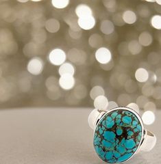 Make a statement with the Bandit's Ridge ring, a bold and stylish sterling silver ring featuring a vibrant Number 8 turquoise stone. This stunning ring is perfect for anyone who loves the beauty of turquoise and the charm of the American Southwest. The Bandit's Ridge Ring is a unique and thoughtful gift for yourself or someone special, adding a touch of adventure and elegance to any outfit.Size 7PERFECTION. EVERY TIMEAt Rob Sherman Designs, we believe in the beauty of the imperfectly perfect. Ou Turquoise Ring With Large Stone, Turquoise Ring With Large Stone For Anniversary, Oval Turquoise Ring With Polished Finish, Polished Turquoise Ring As Gift, Polished Turquoise Ring For Gift, Sterling Silver Turquoise Promise Ring, Sterling Silver Rings With Large Turquoise Stone, Imperfectly Perfect, American Southwest