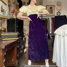 Vintage 60s velvet gown * Royal amethyst purple crushed velvet maxi dress * Crisp Edwardian cream bodice with satin sheen * Ruffled jabot collar & puff sleeves with delicate crochet hem * Metal zip back closure concealed under panel of fabric buttons * Empire waist fit with sleek A-line silhouette & crisp lining *  Super unique piece so a bit stumped on era - has unfinished seams, metal back zip, nylon horsehair braid hem.. my guess is 60s.  Tag reads "Triss". Vtg 10. Fits like a small. Very well made & in flawless condition.  Measures- Pit to pit: 17-17.5" Empire waist/ underbust: 14" True waist: 15" max  Hips: 22" Length: 56" I'm 5'7" - 36/25/38 for reference. Snug on bust Horsehair Braid Hem, Jabot Collar, Horsehair Braid, Vintage Velvet Dress, Crochet Hem, Delicate Crochet, 60s And 70s Fashion, Velvet Maxi, Velvet Maxi Dress