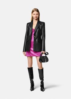 This single-breasted leather blazer is accented by Medusa hardware and has peaked lapels and a structured silhouette. Night Out Single Breasted Blazer Dress With Notch Lapel, Luxury Notch Lapel Blazer Dress For Party, Designer Notch Lapel Blazer For Evening, Designer Evening Blazer With Notch Lapel, Luxury Fall Evening Blazer Dress, Luxury Blazer Dress For Fall Semi-formal, Luxury Blazer Dress For Night Out In Fall, Luxury Fall Blazer Dress For Semi-formal Occasions, Luxury Blazer Dress For Evening In Fall