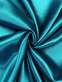 Elevate your sewing projects with our luxurious 60" Wide 100% Polyester Shiny Heavy Bridal Satin Fabric. This high-quality polyester satin boasts a rich, lustrous sheen that adds an opulent touch to bridal gowns, evening wear, and formal attire. The heavy weight and sturdy construction ensure your creations drape beautifully and maintain their shape. With a width of 60 inches, this fabric offers ample material for seamless cutting and minimal waste. Whether you're a professional dressmaker or an avid crafter, this versatile satin fabric is the perfect choice for creating elegant and sophisticated designs. Its shimmering surface catches the light, adding a touch of glamour to any occasion. Explore the endless possibilities and bring your couture visions to life with this exquisite 60" Wide Wedding Dress Fashion, Hall Colour, Pretty Crafts, Fascinator Hairstyles, Fashion Crafts, Colour Theory, Festival Skirts, Bridal Fabric, For Wedding Dress