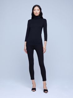 An essential, slim-fit black turtleneck with a three-quarter length sleeve. Ultra-soft luxe microfiber fabrication provides supreme comfort while smoothing the silhouette. Aja pairs and layers with easily with a blazer and jeans. Blazer And Jeans, Susanne Kaufmann, Womens Turtleneck, Black Turtleneck, Woven Top, Engineered Garments, Turtleneck Sweater, Three Quarter, Length Sleeve