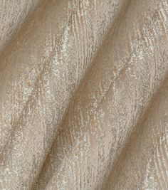 an up close shot of a beige fabric