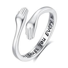 PRICES MAY VARY. 🤗 STERLING SILVER - Crafted from 925 silver, this hug ring is made to shine and last. The sterling silver material ensures durability and a stunning, polished look. 🤗 HUG RING - It represents a warm and heartfelt embrace, conveying love, comfort, and a deep connection between two individuals. It serves as a reminder of the bond shared and the support given to each other. 🤗 ENGRAVED "MY HEART HUGS YOU EVERY MOMENT" - This ring encapsulates the essence of love and affection. Th Personalized Sterling Silver Rings For Friendship, Personalized Silver Friendship Rings, Sterling Silver Friendship Ring, Friendship Sterling Silver Ring, Meaningful Silver Rings For Valentine's Day, Meaningful Hypoallergenic Silver Rings, Heart Hugs, Hug Ring, Angel Wing Ring