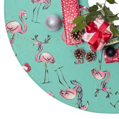 a flamingo themed tray with christmas presents on it