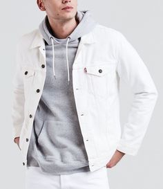 From Levi's®&#x2C; this jacket features:denim fabricationclassic Red Tab™ stylingclassic fitspread collarlong sleevesbutton frontbuttoned chest pocketswelt pocketshits at the waistcottonmachine washImported. White Jacket Outfit, Trucker Jacket Men, Mens Fashion Smart, Denim Trucker Jacket, White Denim Jacket, Outfit Trends, Mens Winter Fashion, White Jacket, Trucker Jacket