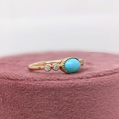 This beautiful ring features a bezel set east west turquoise gemstone of 0.73 carat with milgrain detail and natural earth mined diamonds, all set in solid 14K gold. This ring can be lovely December birthstone gift for your loved ones! This ring is made with solid 14K Gold and natural Earth mined SI / G-H diamonds. As listed, this ring is ready to ship. If you're interested in purchasing this setting with a different center stone please message us! Designer Silver Jewellery, Jewelry Showcases, Birthstone Gifts, December Birthstone, Natural Earth, Beautiful Ring, East West, Earring Findings, Pendant Bracelet