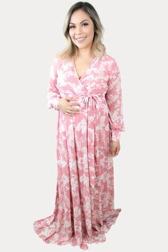 This is the perfect pink floral maternity maxi. Features a gorgeous pink color with a standout white floral print. The sweetheart neckline is perfect for nursing, long loose sleeves, and a tie waistline to keep you comfy! An ideal floral baby shower maxi, date night dress, or just because. Designed for wear throughout all nine months of pregnancy and beyond! Months Of Pregnancy, Date Night Dress, Pregnancy Months, Loose Sleeves, Maternity Maxi, Nine Months, Perfect Pink, Floral Baby Shower, Date Night Dresses