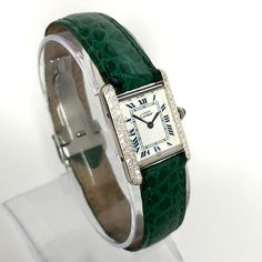 The Cartier Must de Cartier Tank Sterling Silver Diamond Women's Watch 20mm 0.5ct is a timeless classic. This Luxurious Cartier watch is pre-owned, in excellent condition, and comes in an original box with a full warranty from ItsHot.com. Whether you're looking for a classic timepiece or a luxurious statement piece, the  Cartier Must de Cartier Tank Sterling Silver Diamond Women's Watch 20mm 0.5ct is the perfect choice. Each watch can be additionally customized with diamonds (please contact us f Diamond Jewelry Store, Cartier Tank, Cartier Watch, Women's Watch, Silver Diamonds, Timeless Classic, Cartier, Time Piece, Jewelry Stores