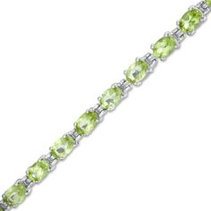 Amaze her with this gorgeous gemstone tennis bracelet. Created in sterling silver, this attractive choice showcases a row of 6.0 x 4.0mm oval-shaped spring-green peridot. Buffed to a brilliant luster, this 7.25-inch bracelet secures with a box clasp. Green Gemstone Bracelets, Green Oval Bracelets For Anniversary, Green Oval Tennis Bracelet As Gift, Green Oval Tennis Bracelet For Gift, Classic Green Oval Tennis Bracelet, Oval Morganite Ring, Morganite Necklace, Morganite Earrings, Morganite Pendant