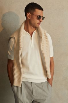 The Ivor polo shirt is made from a stretchy blend of cotton and modal and it’s complete with a textured touch. A gold-tone half-zip neckline customises the shape. Cotton-modal blend Textured Half-zip polo neckline Off White Men Outfit, Polo Shirt Man Outfit, How To Style Polo Shirt For Men, Men Polo Outfit, White Polo Outfit Men, Elegant Men Outfits, White Polo Shirt Outfit Men, White Polo Outfit, White Outfit Men