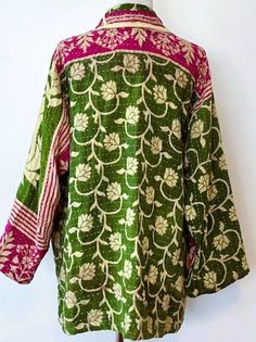 Bestseller, Short Kantha Jacket Is In High Demand. Soft, comfortable, One Size fits most, and fully reversible. Looks great on just about everyone. Known as a Gudri Coat, has quite a fan following: affordable, select prints, deep side pockets , and of course reversible. Manufacturer is easily identified by the distinct collar. The Kantha stitch is recognizable on either side of the jacket (top stitching). Fabric selected follow the vintage look whenever possible. Light weight, perfect for the of Traditional Green Long Sleeve Outerwear, Green Embroidered Cotton Outerwear, Embroidered Green Cotton Outerwear, Green Cotton Outerwear With Floral Embroidery, Traditional Green Outerwear For Fall, Silk Tank Dress, Kantha Fabric, Mixed Prints, Kantha Jacket