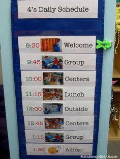 a blue bulletin board with pictures on it and the words, 4's daily schedule