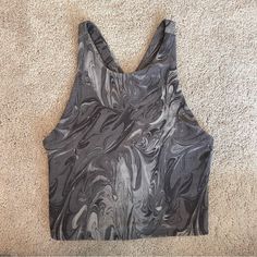 Grey/White/Black Marbled Abercrombie & Fitch Cross Back Tank. Features A Halter Neckline With A Cross Back. Double Lined For Extra Support. Would Work Great As A Top For A Casual Outfit Or As A Gym Top. Size Xs, Has A Good Amount Of Stretch, Nwot. Trendy Fitted Gray Crop Top, Fitted Gray Crop Top For Workout, Chic Fitted Gray Crop Top, Chic Gray Stretch Crop Top, Fitted Gray Crop Top For Spring, Gym Tops, A Gym, Halter Neckline, Casual Outfit