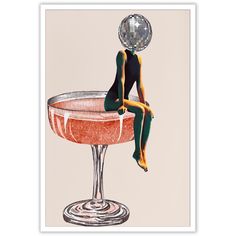 a woman sitting on top of a wine glass with a disco ball above her head