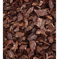 a pile of wood chips sitting on top of a table