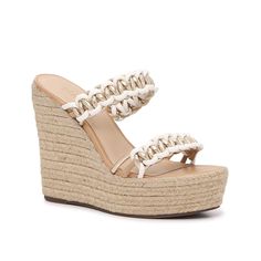 Schutz-Juliet Sandal Elevate your casual looks or finish off formal 'fits with the Juliet sandal from Schutz. Featuring the silhouette of a classic wedge, this pair features an elegant double strap design that is crafted with interlocking goldtone details. Perfect for styling with paperbag shorts or a sweet sundresses. Synthetic Double Strap Wedge Sandals, Spring Double Strap Synthetic Wedge Sandals, Synthetic Double Strap Wedge Sandals For Spring, Leather Double Strap Wedge Sandals For Spring, Double Strap Wedge Sandals With Heel Loop, Summer Double Strap Wedge Sandals, Synthetic Wedge Sandals With Braided Straps, Elegant Synthetic Wedge Sandals For Vacation, Synthetic Open Toe Wedge Sandals With Braided Straps