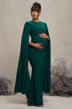 Divine Timing | Bottle Green Maternity Maxi Dress With Cape Sleeves Formal Dresses Maternity, Maternity Gala Dress, Green Baby Shower Dress For Mom, Elegant Maternity Outfits, Pregnant Dress For Wedding Guest, Emerald Green Maternity Dress, Maternity Dresses For Wedding Guest, Pregnant Wedding Guest Outfit, Pregnant Dress Elegant