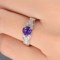 Amethyst Ring Antique Engagement Ring February Birthstone White Gold Twig Art Deco Milgrain Leaf Filigree Flower Vine Anniversary Promise ITEM INFORMATION: Metal Type: Solid 14K White Gold Band Width: 1.7mm Size: US4-9 Center Stone: 5.5mm Natural Amethyst Side Stone: Natural Diamond Weight: 0.09CT Cut: Round cut Clarity: SI-VS Color: G-H √ CUSTOM √ LAYAWAY √ ENGRAVING √ GIFT WRAPPING For matching this ring, you can have: * https://www.etsy.com/listing/609566461 * https://www.etsy.com/listing/595 Purple Amethyst Ring With Accent Stones, Elegant Purple Birthstone Ring, Purple Birthstone Ring With Round Stone For Wedding, Purple Gemstone Ring With Round Stone, Purple Round Stone Ring For Anniversary, Purple Birthstone Ring For Wedding With Round Stone, Purple Birthstone Ring With Round Center Stone, Purple Gemstone Rings With Round Stone, Purple Round Stone Anniversary Ring