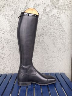 Please call or email me If you need a boot in a specific size. It takes 8 weeks to arrive from Italy, prices do vary depending on what you need . DeNiro Boot Company is famous for quality, style, and innovation in the Equestrian World. It is the time spent on research and attention to detail that has allowed DeNiro Boot Co. to become one of the industries market leaders in boot production. All the DeNiro Boots are handcrafted in their own factory, in Lecce, in the heel of Italy. All the boots su Elegant Fitted Riding Knee-high Boots, Fitted Black Knee-high Riding Boots, Round Toe Boots For Winter Galas, Winter Gala Boots With Round Toe, Elegant Knee-high Riding Boots, Classic Round Toe Riding Boots, Classic Round Toe Riding Heeled Boots, Leather Sole Round Toe Boots For Shows, Classic Fitted Knee-high Boots With Leather Sole