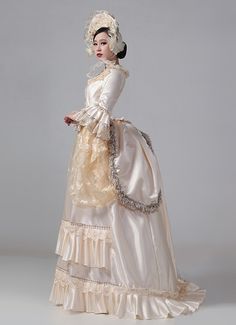 Champagne Victorian Bustle Reenactment Costumes Carnival Masquerade Party Dresses     Condition: Brand New   Color:Champagne   Material: This dress made of High Quality Satins,Lace, soft,smooth and comfortable to wear   Sleeve Length:Long Sleeve   Dresses Length:Floor-Length   Neckline:Square Collar   Decoration: Ruffles + Lace   Applicable People:Adult   Package Includes: Dress    amp;nbsp;     The length of skirt about 45 inches (114 cm) long from waist to hem regardless of size. This dress is Bustle Dress Victorian, Elegant Long Sleeve Costume Dress, Elegant Beige Costume Dress, Beige Fitted Dress For Costume, Spring Vintage Dress For Costume, Marie Antoinette Style Gown For Costume Events, Cream Fitted Ball Gown, Fitted Cream Ball Gown, Fitted Cream Ball Gown Dress