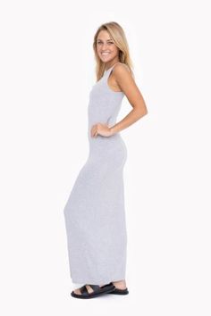 Stylish and comfortable maxi dress. Product Description: Unleash your beachy side with our Keyhole Back Maxi Dress! This soft, drapey rayon blend fabric will keep you comfortable on your stroll, while the keyhole detail adds a touch of elegance. Dress it up for date night or keep it casual for a walk by the shore. A versatile must-have! Fit: Model is 5'7" and is wearing a size Small. Material: 95% Rayon 5% Spandex Sleeveless Modal Dress For Loungewear, Summer Sleeveless Modal Dresses, Summer Stretch Maxi Dress With Side Slits, Stretch Maxi Dress With Side Slits For Summer, Elegant Sleeveless Loungewear Maxi Dress, Elegant Sleeveless Maxi Dress For Loungewear, Long Maxi Dress For Vacation, Elegant Sleeveless Maxi Lounge Dress, Summer Modal Dresses For Loungewear