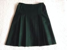 Materials: green pleated mini skirt 70s pleated skirt, dark forest green skirt, preppy spring skirt, probably wool, handmade minimalist skirt, elegant basic simple green skirt. very good vintage condition but the item is not dry clean. Measurements laying flat : waist :38 cm (15 inches) hips :44 cm (17,5 inches) total lenght :61 cm (24 inches) Forest Green Skirt, Minimalist Skirt, Dark Green Skirt, Skirt Preppy, Spring Skirt, Preppy Spring, Oc Design, Skirt Elegant, Spring Skirts