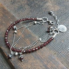 "Handmade, delicate oxidized sterling silver bracelet with garnets. The bracelet is made of silver 925 and garnets quality AAA (4 mm). It is available with either raw or polished finish. We offer bracelets in many sizes: 6\" (15 cm), 6.5\" (16,5 cm), 7\" (18cm), 7.5\" (19 cm), 8\" (20,5 cm). Choose the one that is most similar for your wrist circumference and share your actual wrist circumference in the note to your order. This way we can perfectly adjust the size of your bracelet. We send jewel Vintage Navajo Jewelry, Oxidized Silver Bracelet, Jewelry Outfit, Gorgeous Bracelet, Oxidized Silver, Beads And Wire, Oxidized Sterling Silver, Mens Accessories Fashion, Sterling Silver Bracelet