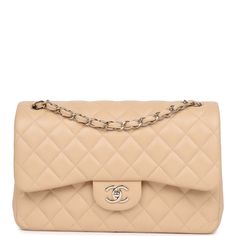 This Jumbo Classic Double Flap bag is in light beige caviar leather with gold tone hardware and features a front flap with signature CC turnlock closure, half moon back pocket, and adjustable interwoven gold tone chain link and light beige leather shoulder strap.The interior is lined in light beige leather with a "love letter" zipper compartment under the first flap, an "outer" slit pocket under the second flap, and an interior compartment with two open pockets separated by a "lipstick" compartment.Collection: 19C (2019)Origin: ItalyCondition: Pre-owned; Excellent to Mint - This bag retains its shape. There's no plastic on the hardware but no signs of scratching. The exterior leather shows signs of wear with some minor spots to the front bottom corner and minor discoloration to the back ex Beautiful Wardrobe, Chanel Jumbo, Chanel Box, Birkin 25, Bottega Veneta Shoulder Bag, Front Bottoms, Bag Light, Color Swatch, Flap Bag