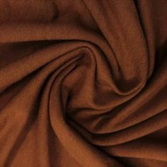 a close up view of a brown fabric