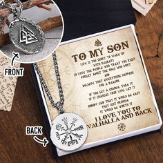 a necklace with the words to my son and an image of a compass on it