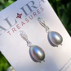 "6546 Grey Pearl Earrings Sterling Silver freshwater pearls small delicate dainty dangle drops cubic zirconia cz studs June birthstone birthday anniversary Valentine's day Mother's day Christmas holiday gift for her women mom sister wife girlfriend daughter niece aunt grandma cousin colleague best friend. Enjoy the beauty & power of natural gemstone. MATERIALS & DIMENSIONS ✦ Freshwater PEARL, grey, ovals approx. 11x9mm; ✦ STERLING SILVER pins and cubic zirconia (CZ) stud ear wires; ✦ The total l Pear Shaped Teardrop Earrings With Pearl Charm As Gift, Silver Pearl Teardrop Earrings As Gift, Silver Pearl Teardrop Earrings For Gift, Teardrop Cubic Zirconia Pearl Earrings For Anniversary, Cubic Zirconia Teardrop Pearl Earrings For Anniversary, Elegant Pear-shaped Teardrop Earrings As Gift, Silver Teardrop Earrings With Pearl Charm As Gift, Nickel-free Teardrop Pearl Earrings For Anniversary, Nickel Free Teardrop Pearl Earrings For Anniversary