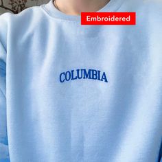 "*SIZES ARE UNISEX* -I'd suggest your usual size for a regular fit, or sizing up for a more relaxed fit. *these sweatshirts are extra comfy when oversized \"Columbia\" embroidered on a comfy cute crewneck. A sturdy and warm sweatshirt bound to keep you warm in the colder months. A pre-shrunk, classic fit sweater that's made with air-jet spun yarn for a soft feel and reduced pilling. Your new favorite sweatshirt! * 50% cotton, 50% polyester * Pre-shrunk * Classic fit with no center crease * 1x1 a Columbia Sweatshirt, Crewneck Embroidery, Embroidery Crewneck, Cute Crewneck, Paris Shirt, Christian Sweatshirt, Embroidered Crewneck, Embroidery Sweatshirt, Champion Hoodie