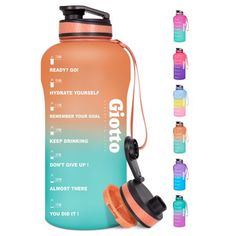 an orange and blue water bottle with the words go on it next to other bottles