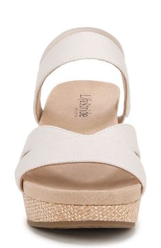 Interlocking vamp straps create modern dimension on a summer-ready sandal lofted by a cork-wrapped platform and integrated wedge heel. 2 1/2" heel; 1 1/4" platform Elasticized slingback strap Soft System® cushioned footbed for all-day flexibility and underfoot comfort Textile upper and lining/synthetic sole Imported Beige Synthetic Slingback Wedge Sandals, Comfortable Wedges Sandals, Medium Width 4-inch Wedge Heel Sandals, Vacation Wedge Heel Sandals With Cork-bed Midsoles, Beach Wedge Sandals With Cork-bed Midsoles And Open Heel, Summer T-strap Synthetic Wedge Sandals, Summer Wedge Heel Slingback Sandals With Cork-bed Midsoles, French Pink, Shoes Heels Wedges