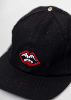 Six panel leather strap cap in black from chrome hearts in collaboration with matty boy. features embroidered detailing above the fastening strap and above the brim. tonal stitching throughout.    one size  925 silver  imported Chrome Hearts, Gift Store, Dad Hat, Red Lips, Corporate Gifts, Dad Hats, Leather Straps, 925 Silver, Stitching